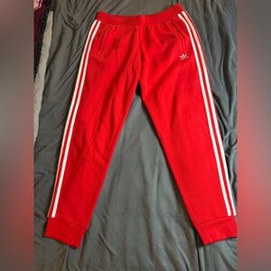 Adidas Women's Red Joggers with White Stripes